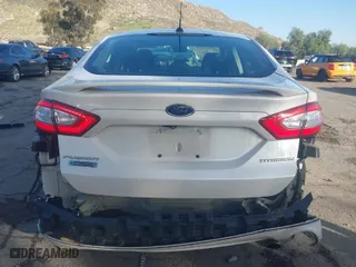 2016 Ford Fusion Energi Titanium with VIN 3FA6P0SU5GR144908, listed as a IAAI auction lot 41701812 with 98,332 mi miles. Bid and sale history available at carsss.com. Image 16.