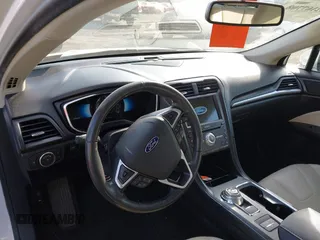 2017 Ford Fusion Hybrid Titanium с VIN 3FA6P0RU7HR148191, выставлен на аукционе IAAI как лот 42167708 с пробегом 72 708 миль миль и . История ставок и продаж доступна на DreamBid. Изображение 20.