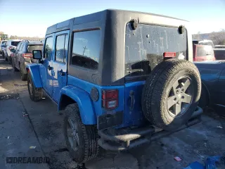 2015 Jeep Wrangler Unlimited Sport with VIN 1C4BJWDG1FL573349, listed as a Copart auction lot 86879394 with 96,773 mi miles and Salvage Title. Bid and sale history available at carsss.com. Image 2.