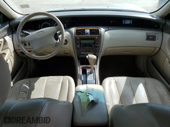 2000 Toyota Avalon XL z VIN 4T1BF28B7YU074685, wystawiony jako Copart lot #54523145 z przebiegiem 172 258 mil mil oraz Szkoda całkowita • Salvage title. Historia ofert i sprzedaży dostępna na DreamBid. Obrazek 8.