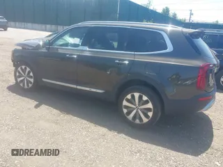 2020 Kia Telluride S with VIN 5XYP6DHC4LG085717, listed as a IAAI auction lot 42436243 with 56,930 mi miles and . Bid and sale history available at DreamBid. Image 3.