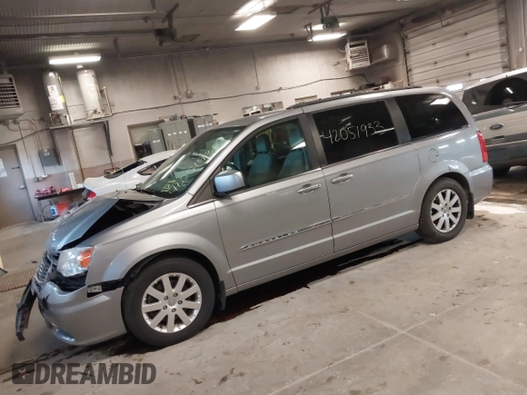 2013 Chrysler Town & Country Touring with VIN 2C4RC1BG1DR646691, listed as a IAAI auction lot 42051933 with 162,960 mi miles. Bid and sale history available at carsss.com. Image 17.