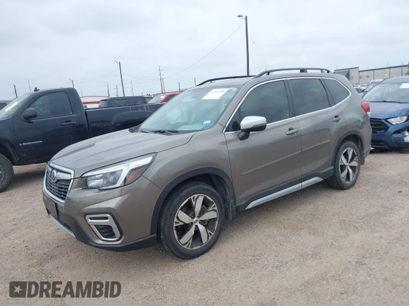 2021 Subaru Forester Touring with VIN JF2SKAXC9MH556986, listed as a IAAI auction lot 41717748 with 33,573 mi miles. Bid and sale history available at carsss.com. Image 2.