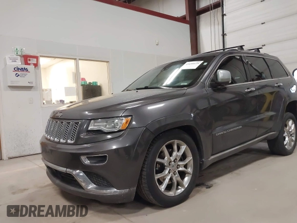 2015 Jeep Grand Cherokee Summit with VIN 1C4RJFJT6FC754799, listed as a IAAI auction lot 41699124 with 124,206 mi miles and . Bid and sale history available at DreamBid. Image 17.