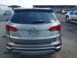 2017 Hyundai Santa Fe 2.4L z VIN 5NMZU3LB7HH025791, wystawiony jako IAAI lot #42277964 z przebiegiem 154 110 mil mil oraz . Historia ofert i sprzedaży dostępna na DreamBid. Obrazek 16.