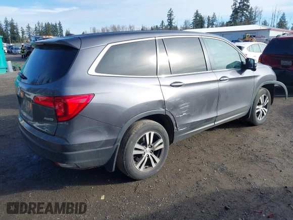 2017 Honda Pilot EX-L with VIN 5FNYF6H5XHB059834, listed as a IAAI auction lot 41670003 with 58,285 mi miles and . Bid and sale history available at DreamBid. Image 4.