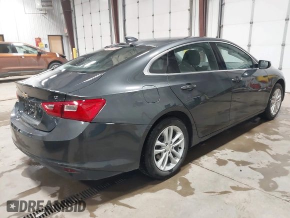 2018 Chevrolet Malibu LT with VIN 1G1ZD5ST9JF158845, listed as a IAAI auction lot 42412518 with 83,301 mi miles and . Bid and sale history available at DreamBid. Image 4.