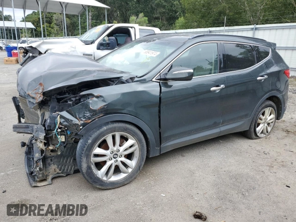 2013 Hyundai Santa Fe Sport z VIN 5XYZUDLAXDG082486, wystawiony jako Copart lot #68941974 z przebiegiem Nie podano mil oraz Szkoda całkowita • Salvage title. Historia ofert i sprzedaży dostępna na DreamBid. Obrazek 1.