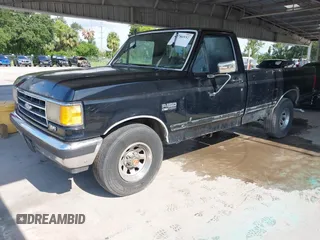 1990 Ford F-150 with VIN 1FTDF15N1LNA45594, listed as a IAAI auction lot 42786932 with 1,439 mi miles and . Bid and sale history available at DreamBid. Image 2.