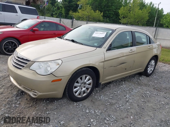2010 Chrysler Sebring Touring z VIN 1C3CC4FBXAN210425, wystawiony jako IAAI lot #42275197 z przebiegiem 123 200 mil mil oraz . Historia ofert i sprzedaży dostępna na DreamBid. Obrazek 2.