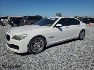 2013 BMW 7 Series 740Li with VIN WBAYE4C52DD136841, listed as a Copart auction lot 48608895 with 99,436 mi miles and Clean Title. Bid and sale history available at carsss.com. Image 1.