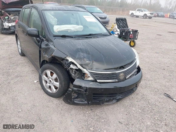 2009 Nissan Versa 1.8 S with VIN 3N1BC13E99L423269, listed as a IAAI auction lot 41490644 with 124,241 mi miles. Bid and sale history available at carsss.com. Image 6.