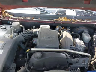 2004 GMC Envoy SLT with VIN 1GKDS13SX42334503, listed as a IAAI auction lot 42038781 with 242,680 mi miles. Bid and sale history available at carsss.com. Image 10.