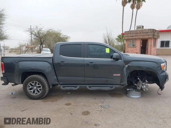 2016 GMC Canyon 4WD SLE with VIN 1GTG6CE3XG1224575, listed as a IAAI auction lot 41265987 with 118,345 mi miles. Bid and sale history available at carsss.com. Image 13.