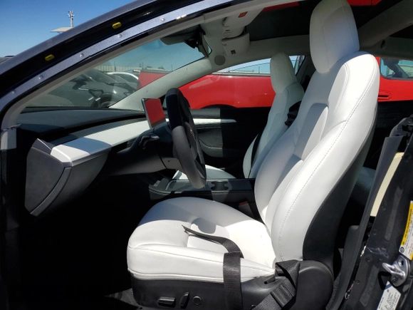 2022 Tesla Model 3 z VIN 5YJ3E1EA2NF336165, wystawiony jako Copart lot #80166114 z przebiegiem 23 097 mil mil oraz Szkoda całkowita • Salvage title. Historia ofert i sprzedaży dostępna na DreamBid. Obrazek 7.