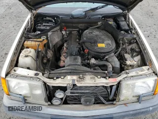1987 Mercedes-Benz 300 E with VIN WDBEA30D0HA528424, listed as a Copart auction lot 84249444 with 132,054 mi miles and Clean Title. Bid and sale history available at carsss.com. Image 11.
