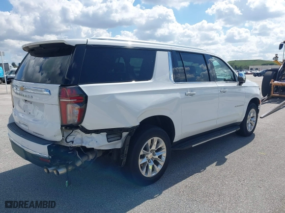2023 Chevrolet Suburban Premier with VIN 1GNSCFKD9PR387180, listed as a IAAI auction lot 40433867 with 40,936 mi miles. Bid and sale history available at carsss.com. Image 4.