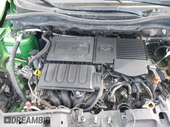 2012 Mazda 2 Sport with VIN JM1DE1KZ4C0140559, listed as a IAAI auction lot 41265959 with 139,364 mi miles and . Bid and sale history available at DreamBid. Image 10.