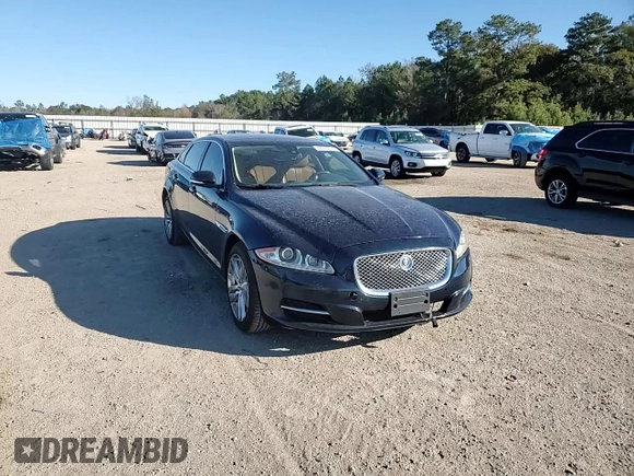 2013 Jaguar XJ with VIN SAJWA2G16DLV50973, listed as a Copart auction lot 82555074 with 148,956 mi miles and Salvage Title. Bid and sale history available at carsss.com. Image 11.