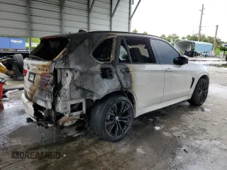 2015 BMW X5 M z VIN 5YMKT6C55F0C89468, wystawiony jako Copart lot #75391074 z przebiegiem Nie podano mil oraz Szkoda całkowita • Salvage title. Historia ofert i sprzedaży dostępna na DreamBid. Obrazek 3.