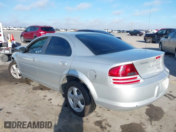 2005 Dodge Stratus SXT z VIN 1B3EL46R65N617926, wystawiony jako IAAI lot #41658286 z przebiegiem 75 030 mil mil oraz . Historia ofert i sprzedaży dostępna na DreamBid. Obrazek 3.