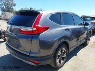 2018 Honda CR-V LX with VIN 2HKRW5H30JH407287, listed as a IAAI auction lot 41866888 with 131,741 mi miles. Bid and sale history available at carsss.com. Image 4.