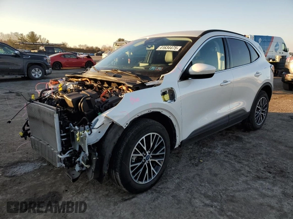 2022 Ford Escape Titanium Plug-In Hybrid с VIN 1FMCU0LZ5NUA57513, выставлен на аукционе Copart как лот 41634475 с пробегом 52 542 миль миль и Списание • Salvage title. История ставок и продаж доступна на DreamBid. Изображение 1.