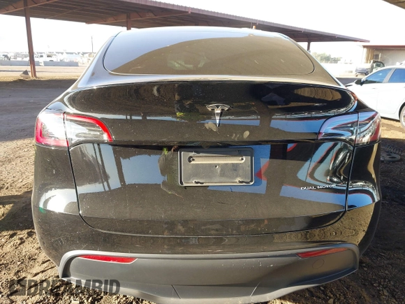2023 Tesla Model Y Long Range with VIN 7SAYGDEE8PF815622, listed as a IAAI auction lot 41515433 with 70,862 mi miles and . Bid and sale history available at DreamBid. Image 16.