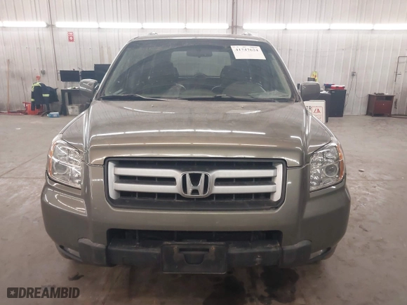 2007 Honda Pilot EX-L with VIN 2HKYF18767H538207, listed as a IAAI auction lot 41747624 with 214,026 mi miles. Bid and sale history available at carsss.com. Image 13.
