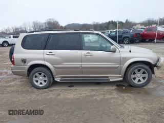 2003 Suzuki XL7 Touring with VIN JS3TX92V334115616, listed as a IAAI auction lot 40899791 with 154,521 mi miles and . Bid and sale history available at DreamBid. Image 14.