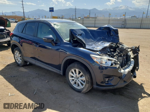 2016 Mazda CX-5 Touring z VIN JM3KE4CY8G0758947, wystawiony jako Copart lot #53140005 z przebiegiem 47 172 mil mil oraz Szkoda całkowita • Salvage title. Historia ofert i sprzedaży dostępna na DreamBid. Obrazek 4.