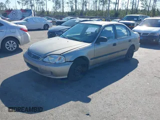 2000 Honda Civic LX with VIN 1HGEJ6577YL022486, listed as a IAAI auction lot 41786438 with 173,488 mi miles and . Bid and sale history available at DreamBid. Image 2.