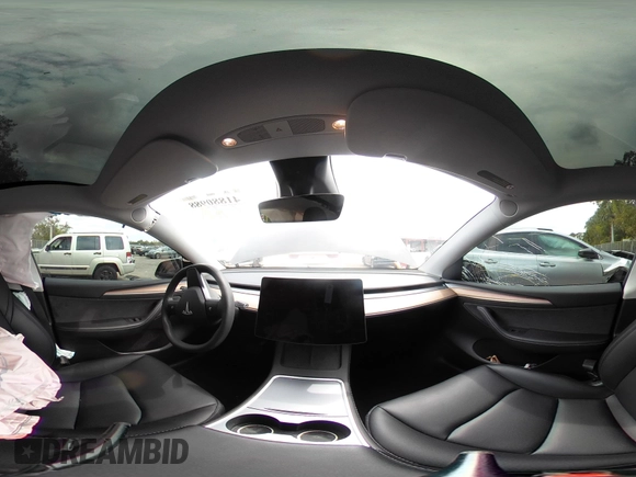 2023 Tesla Model Y Long Range with VIN 7SAYGAEE8PF928923, listed as a IAAI auction lot 41880988 with 18,468 mi miles. Bid and sale history available at carsss.com. Image 18.