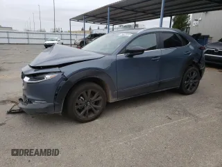 2024 Mazda CX-30 2.5 S Carbon Edition with VIN 3MVDMBCM1RM682198, listed as a Copart auction lot 47795005 with 19,873 mi miles and Non Repairable. Bid and sale history available at carsss.com. Image 1.