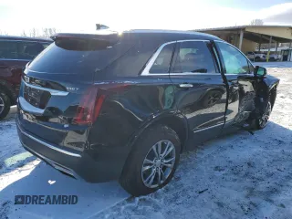 2023 Cadillac XT5 AWD Premium Luxury with VIN 1GYKNDR40PZ136894, listed as a Copart auction lot 45147465 with 42,901 mi miles and Salvage Title. Bid and sale history available at DreamBid. Image 3.