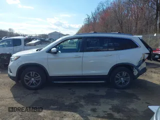 2017 Honda Pilot EX-L z VIN 5FNYF6H71HB061036, wystawiony jako IAAI lot #41891446 z przebiegiem 194 566 mil mil oraz . Historia ofert i sprzedaży dostępna na DreamBid. Obrazek 14.