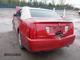 2011 Cadillac STS RWD with VIN 1G6DW6ED4B0128004, listed as a IAAI auction lot 41664631 with 546,850 mi miles and . Bid and sale history available at carsss.com. Image 3.