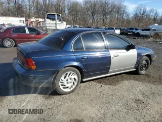 1999 Saturn SL with VIN 1G8ZK5270XZ184042, listed as a Copart auction lot 86827254 with Not Provided miles and Salvage Title. Bid and sale history available at carsss.com. Image 3.