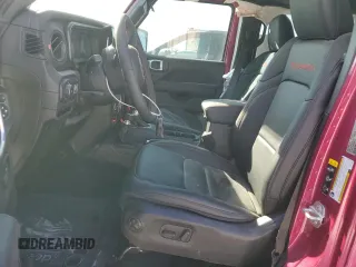 2024 Jeep Wrangler Rubicon with VIN 1C4PJXFG9RW346079, listed as a Copart auction lot 77006914 with 2,446 mi miles and Salvage Title. Bid and sale history available at DreamBid. Image 7.