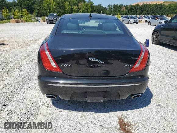 2014 Jaguar XJ Portfolio with VIN SAJWA2GZ2E8V66906, listed as a Copart auction lot 64888135 with 166,194 mi miles and Clean title. Bid and sale history available at DreamBid. Image 6.