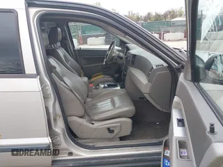 2007 Jeep Grand Cherokee Laredo z VIN 1J8HR48P77C548578, wystawiony jako IAAI lot #41974603 z przebiegiem 179 280 mil mil oraz . Historia ofert i sprzedaży dostępna na DreamBid. Obrazek 5.