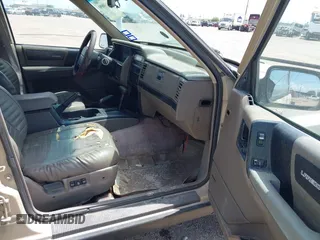 1995 Jeep Grand Cherokee Laredo with VIN 1J4GZ58Y5SC541987, listed as a IAAI auction lot 42430890 with 246,824 mi miles and . Bid and sale history available at DreamBid. Image 5.