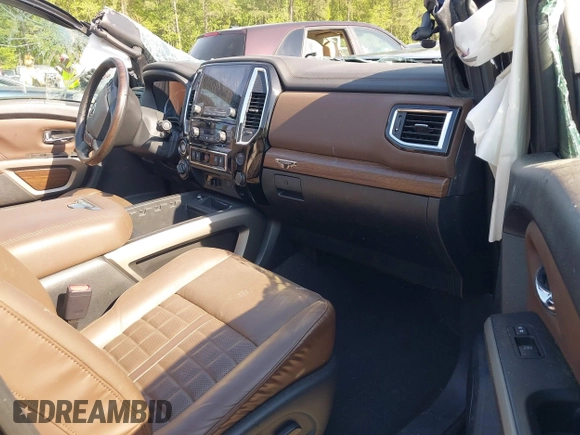 2021 Nissan Titan Pro-4X with VIN 1N6AA1ED4MN515673, listed as a IAAI auction lot 42028678 with 128,719 mi miles and . Bid and sale history available at DreamBid. Image 5.