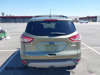 2013 Ford Escape SE with VIN 1FMCU0G99DUC05901, listed as a IAAI auction lot 42194672 with 121,435 mi miles and . Bid and sale history available at DreamBid. Image 17.