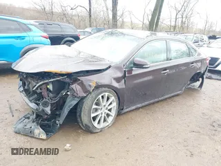 2014 Toyota Avalon Limited z VIN 4T1BK1EB4EU128658, wystawiony jako IAAI lot #41722882 z przebiegiem 53 420 mil mil oraz . Historia ofert i sprzedaży dostępna na DreamBid. Obrazek 2.