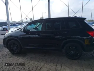 2019 Honda Passport Sport z VIN 5FNYF7H29KB010241, wystawiony jako IAAI lot #41935605 z przebiegiem 84 029 mil mil oraz . Historia ofert i sprzedaży dostępna na DreamBid. Obrazek 14.