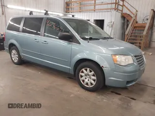2010 Chrysler Town & Country LX with VIN 2A4RR4DE1AR285996, listed as a IAAI auction lot 42236641 with 165,772 mi miles and . Bid and sale history available at DreamBid. Image 1.
