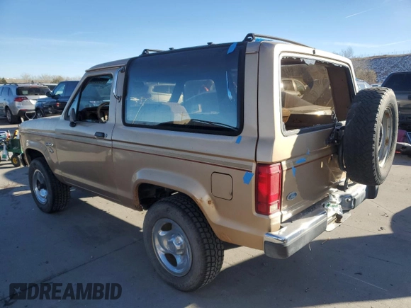 1988 Ford Bronco with VIN 1FMCU14T9JUB53901, listed as a Copart auction lot 84953454 with 222,374 mi miles and Clean title. Bid and sale history available at DreamBid. Image 2.