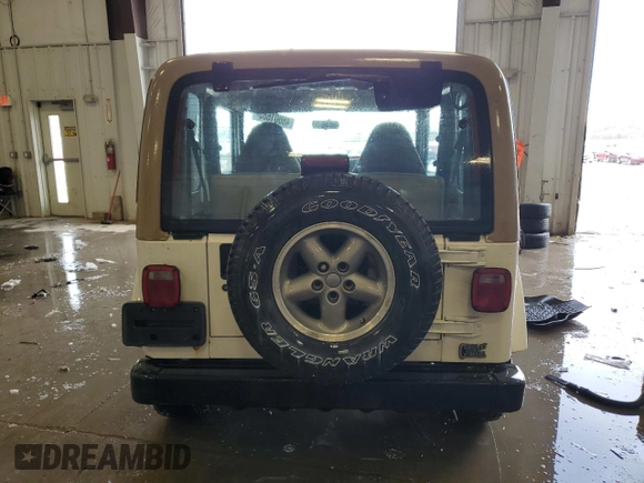 1999 Jeep Wrangler Sahara with VIN 1J4FY49S4XP428955, listed as a Copart auction lot 46001685 with 184,895 mi miles and Clean Title. Bid and sale history available at carsss.com. Image 6.