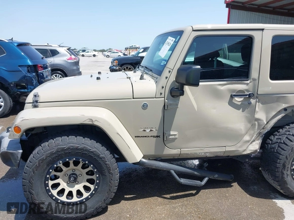 2018 Jeep Wrangler Sahara z VIN 1C4AJWBGXJL811092, wystawiony jako IAAI lot #42305620 z przebiegiem 41 021 mil mil oraz . Historia ofert i sprzedaży dostępna na DreamBid. Obrazek 6.